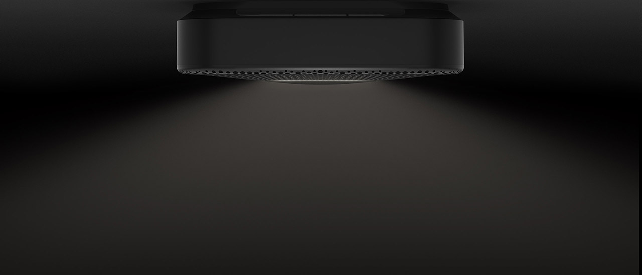 Photograph of the black Nest Protect illuminated to help people navigate their home at night.